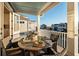 Outdoor dining space on a balcony with neighborhood views at 1646 Red Tide Rd, Mount Pleasant, SC 29466