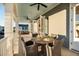 Covered balcony with outdoor dining area at 1646 Red Tide Rd, Mount Pleasant, SC 29466