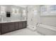 Spa-like bathroom with double vanity, soaking tub, and walk-in shower at 1646 Red Tide Rd, Mount Pleasant, SC 29466