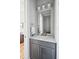 Small bathroom with gray vanity and white countertop at 1646 Red Tide Rd, Mount Pleasant, SC 29466