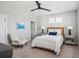 Cozy bedroom with a queen-size bed and an armchair at 1646 Red Tide Rd, Mount Pleasant, SC 29466