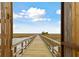 Boardwalk leading to marsh views, offering serene outdoor access at 1646 Red Tide Rd, Mount Pleasant, SC 29466
