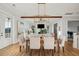 Elegant dining room featuring a wooden table and chandelier at 1646 Red Tide Rd, Mount Pleasant, SC 29466