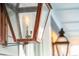 Close-up of an ornate, gas-lit lantern on the front porch at 1646 Red Tide Rd, Mount Pleasant, SC 29466