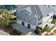 Two-story home with gray siding, three-car garage, and porch at 1646 Red Tide Rd, Mount Pleasant, SC 29466