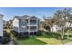 Two-story home with gray siding and screened porch at 1646 Red Tide Rd, Mount Pleasant, SC 29466