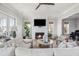 Spacious living area featuring a fireplace and large windows at 1646 Red Tide Rd, Mount Pleasant, SC 29466
