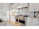 High-end stainless steel range and oven in a bright kitchen at 1646 Red Tide Rd, Mount Pleasant, SC 29466