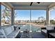 Spacious screened porch with water views and comfortable seating at 1646 Red Tide Rd, Mount Pleasant, SC 29466