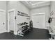 Well-equipped weight room featuring dumbbells and kettlebells at 1646 Red Tide Rd, Mount Pleasant, SC 29466