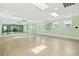 Bright yoga studio with mirrors and hardwood floors at 1646 Red Tide Rd, Mount Pleasant, SC 29466