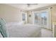 Charming bedroom with two twin beds and access to a private balcony at 209 Charleston Blvd, Isle of Palms, SC 29451