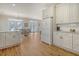 Spacious kitchen with granite countertops, stainless steel appliances, and white cabinets at 209 Charleston Blvd, Isle of Palms, SC 29451