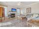 Living room with hardwood floors, fireplace, and comfortable seating at 209 Charleston Blvd, Isle of Palms, SC 29451
