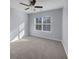 Spacious bedroom with neutral carpeting and a ceiling fan at 217 Forsythia Ave, Summerville, SC 29483