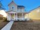 Two-story house with front porch and landscaping at 217 Forsythia Ave, Summerville, SC 29483