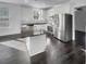 Modern kitchen with stainless steel appliances and an island at 217 Forsythia Ave, Summerville, SC 29483