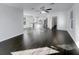 Open concept living area with dark hardwood floors at 217 Forsythia Ave, Summerville, SC 29483