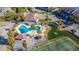 Aerial view of community pool, tennis court, and clubhouse at 25 Mariners Cay Dr, Folly Beach, SC 29439