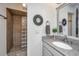 Bathroom with granite countertop, single sink and shower at 25 Mariners Cay Dr, Folly Beach, SC 29439