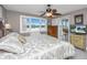 Comfortable bedroom with a king-size bed and access to a balcony at 25 Mariners Cay Dr, Folly Beach, SC 29439