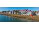 Waterfront condo building with a screened porch at 25 Mariners Cay Dr, Folly Beach, SC 29439