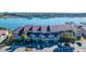 Wide aerial view of condo building and parking at 25 Mariners Cay Dr, Folly Beach, SC 29439