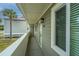 Exterior view of building with walkway, light, and siding at 25 Mariners Cay Dr, Folly Beach, SC 29439