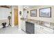 Granite countertop kitchen with stainless steel appliances at 25 Mariners Cay Dr, Folly Beach, SC 29439