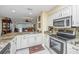 Updated kitchen with granite and stainless steel appliances at 25 Mariners Cay Dr, Folly Beach, SC 29439