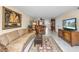 Relaxing living room featuring a sofa and a view into the dining area at 25 Mariners Cay Dr, Folly Beach, SC 29439