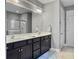 Bathroom with double vanity and a large mirror at 3002 Cross Vine Ln, Summerville, SC 29483