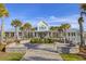 Community center with a courtyard featuring a fountain and palm trees at 3002 Cross Vine Ln, Summerville, SC 29483