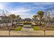 Landscaped courtyard with fountain and walking paths at 3002 Cross Vine Ln, Summerville, SC 29483