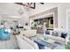 Bright and airy community room with comfortable seating and a bar area at 3002 Cross Vine Ln, Summerville, SC 29483