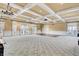 Large community room with high ceilings and elegant carpet at 3002 Cross Vine Ln, Summerville, SC 29483