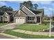 Craftsman style home with stone accents and a 3-car garage at 3002 Cross Vine Ln, Summerville, SC 29483