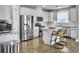 Modern kitchen with stainless steel appliances and white cabinets at 3002 Cross Vine Ln, Summerville, SC 29483