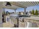 Stainless steel grill with brick outdoor kitchen at 3002 Cross Vine Ln, Summerville, SC 29483