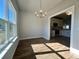 Bright dining room with hardwood floors and chandelier at 3012 Harvey Ave, North Charleston, SC 29405
