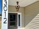 Front entry with stylish lantern at 3012 Harvey Ave, North Charleston, SC 29405