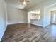 Spacious living room with wood-look flooring and an open concept design at 3012 Harvey Ave, North Charleston, SC 29405