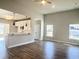 Open concept living room with kitchen view and hardwood flooring at 3012 Harvey Ave, North Charleston, SC 29405