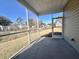 Screened porch with concrete flooring and view of backyard at 3012 Harvey Ave, North Charleston, SC 29405