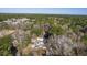 Aerial view showing property with boats and surrounding woods at 3041 Nye View Cir, Mount Pleasant, SC 29466