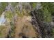 Aerial view of cleared land, ready for building, near wooded area at 3041 Nye View Cir, Mount Pleasant, SC 29466