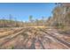 Open field and wooded area with a dirt path at 3041 Nye View Cir, Mount Pleasant, SC 29466