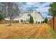 House backyard view with grassy area and fence at 3312 Middlesboro Ave, Summerville, SC 29485
