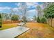 Fenced backyard with patio and swing set at 3312 Middlesboro Ave, Summerville, SC 29485