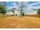 Spacious backyard with large grassy area and wooden fence at 3312 Middlesboro Ave, Summerville, SC 29485